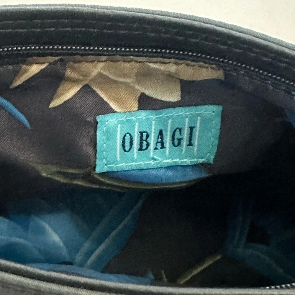 Nylon Obagi makeup bag green